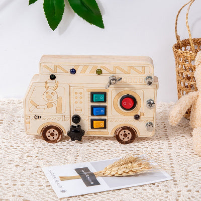 Tableau Montessori Camion de pompier en bois monter avec l'arsenal sonore