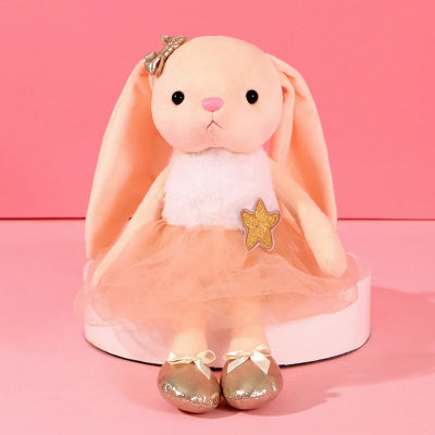 doudou bébé fille aux noeuds et paillettes beige