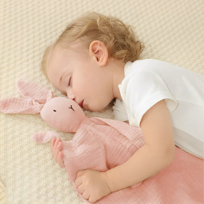 Doudou lapin rose facile le sommeil chez les touts petits