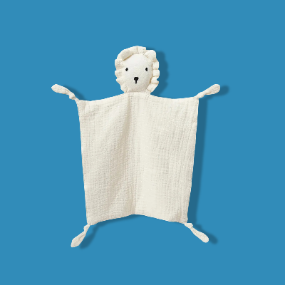 doudou lion plat de couleur beige