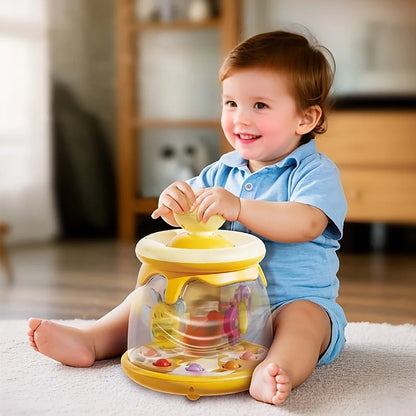 Bébé press, le jouet eveil bebe tourne et il sourit 