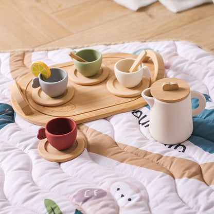 Le rituel du thé sur tapis avec le set jouet pour bébé en bois