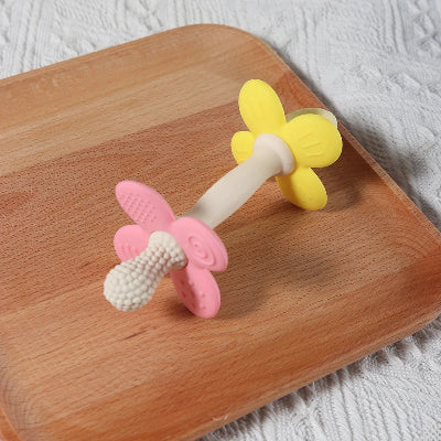 Anneau de dentition petite fleur en silicone à tige blanche