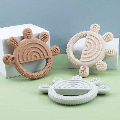 Anneau de dentition  central circulaire pour une prise facile