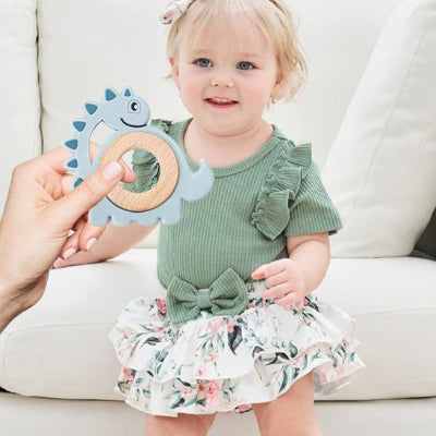 Anneau de dentition incite le bébé à ce mettre debout pour l'atteindre