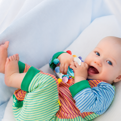 Anneau de dentition rend le bébé calme et souriant