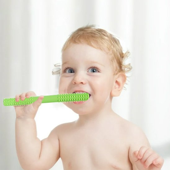 Anneau dentition bébé a forme de tige et bous de brosse a dent