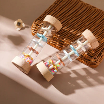 Baton de pluie bébé, pépites d'éveil avec leurs perles colorés, le tube hochet amplificateur de son.