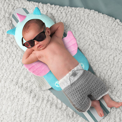 Bébé qui s'endort sur son coussin anti chute bebe