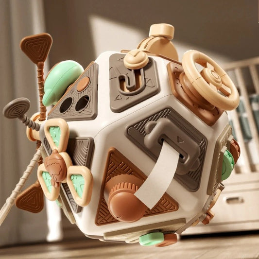 Cube d'activités bébé avec 22 activités marron