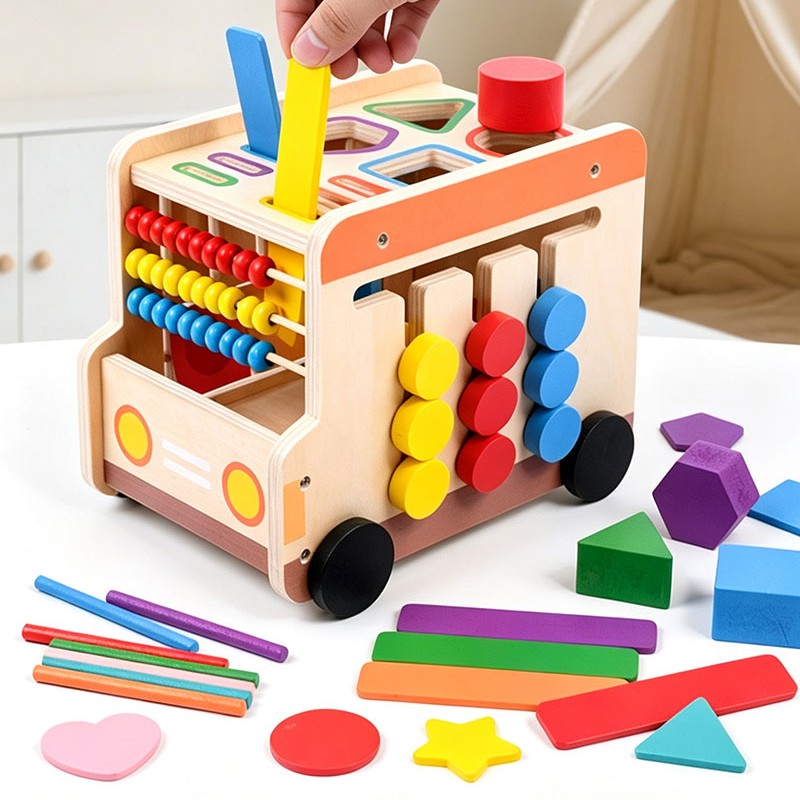 Cube d'activité bébé, bus a neuf activités colorés