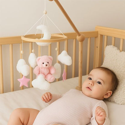 Distinction des forme sur son mobile bebe et premiers gestes motrices