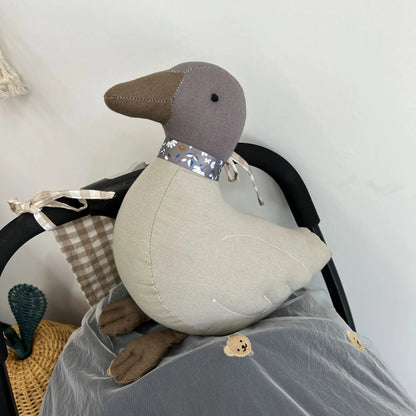 doudou bébé carard pour une caractère sociable