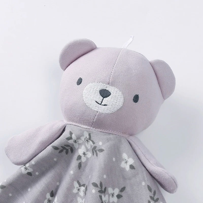 Doudou ours compagnon malicieux