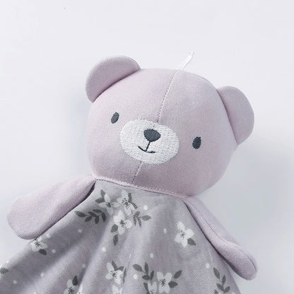 Doudou ours compagnon malicieux