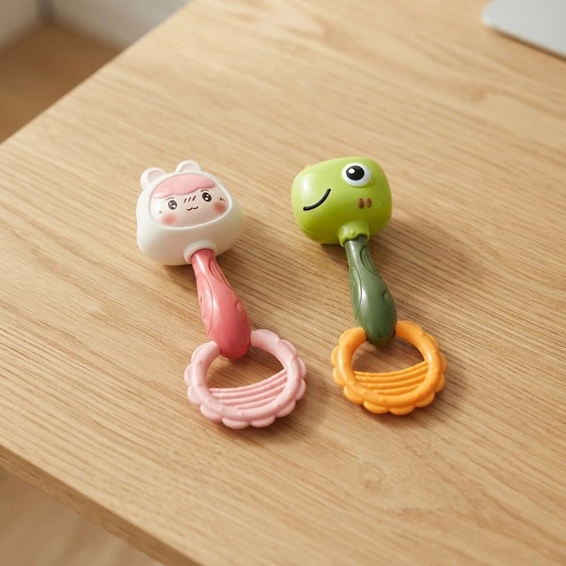 Hochet bébé dinosaure et lapin avec anneau