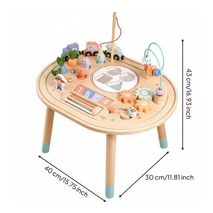 Jouet bebe bois avec plusieurs activités sur une table épurée