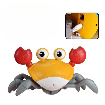 Jouet bebe eveil, crabe dansant chargeable orange.