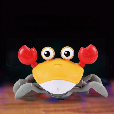 Jouet bebe eveil, crabe dansant a piles orange.