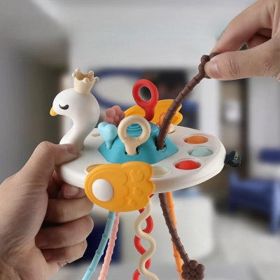 Jouet bebe eveil avec Jeu de ficelle sensorielle à tirer pour développer la force des mains