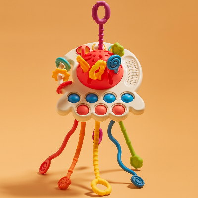 Variante rouge du jouet bebe eveil pieuvre