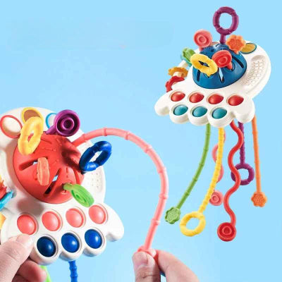 Jouet bebe eveil, Un son est émis lorsqu'on tire sur la corde