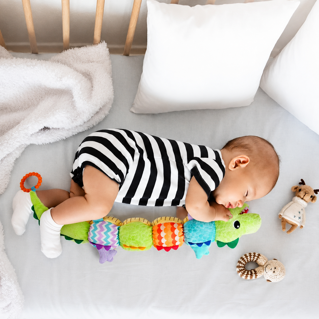 Jouet motricite bebe qui suit sa croissance
