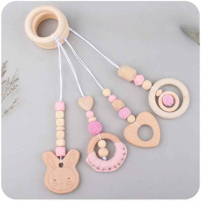 ensemble de 4 pendentifs rose comme jouet pour d'eveil bebe 