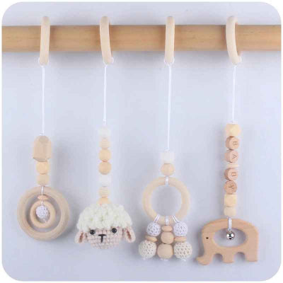 Jouet pour arche d-eveil-brebis en crochet et petite cloche