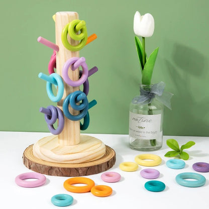 Jouet pour bébé en bois des petits macarons sobre 