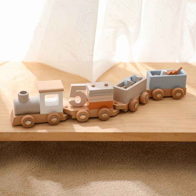 Jouets bois bebe en train de livraison