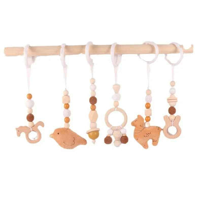 Jouets pour arche d'éveil en 6 pendentifs en bois  de hêtre et nuance de couleurs
