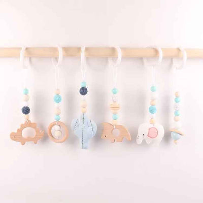 Jouets pour arche d'éveil avec une couleur verte dominante