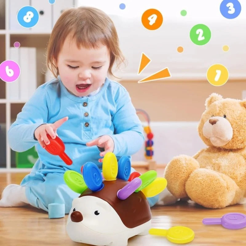 Le cube motricité bébé clic à l'insertion de chaque puzzle 
