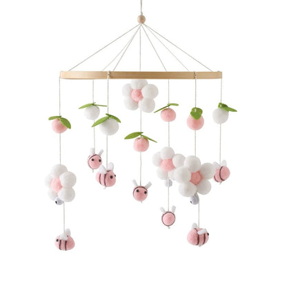 Mobile bebe en abeille rose