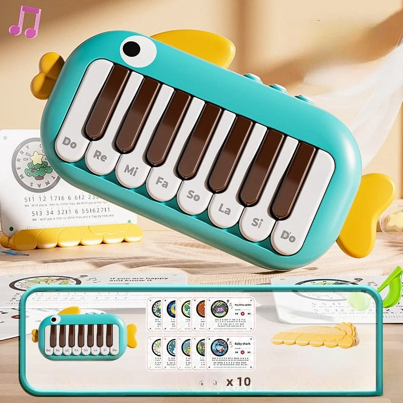 Piano bebe bleu en forme poisson 