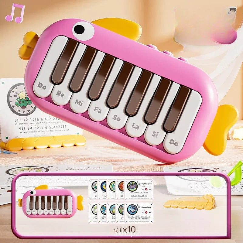 Piano bebe rose en forme poisson 