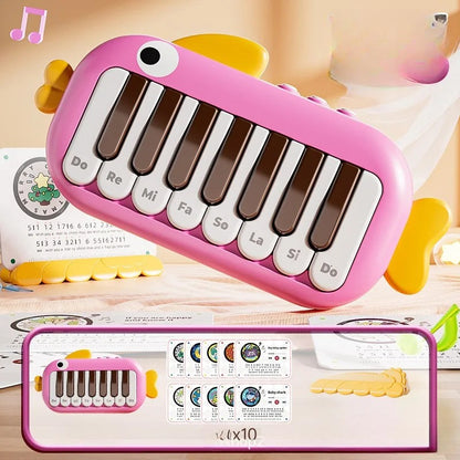 Piano bebe rose en forme poisson 