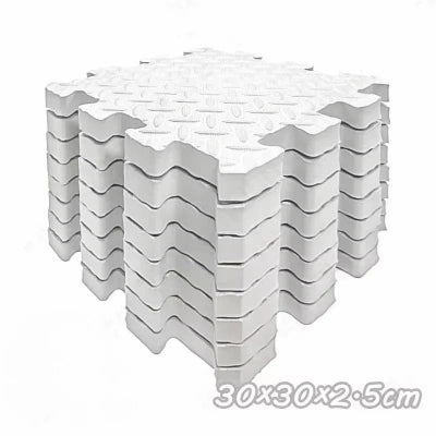 Tapis anti choc blanc de huit dalles