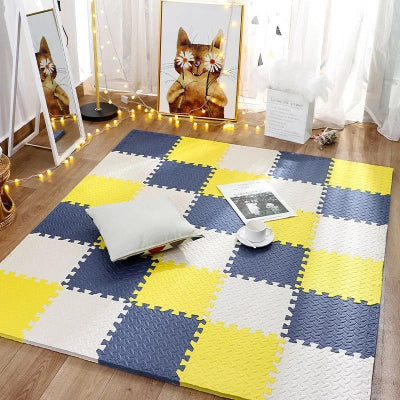 Tapis anti choc bebe couleur blanc jaune et turquoise pour les séances d'éveil