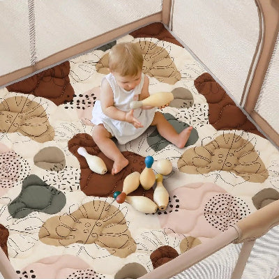Tapis de sol pour bebe rembourré pour des jeux intenses.