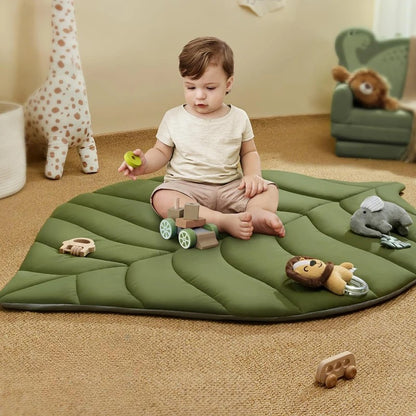 Jouer sur son tapis d'éveil bébé comme a l'air libre 
